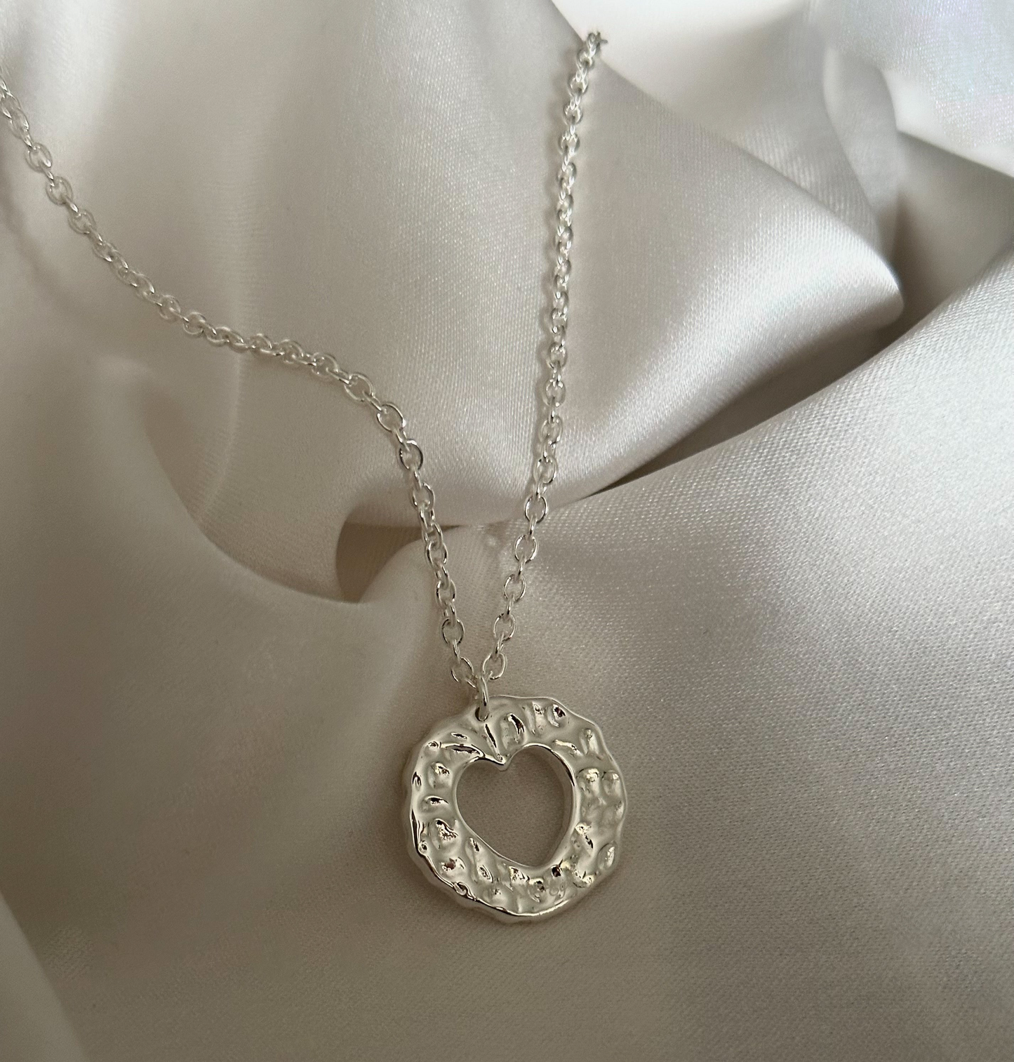 Amor necklace. Chain with heart pendant. Irregular circle pendant with a heart inside. 925 sterling silver alterego chunky jewelry