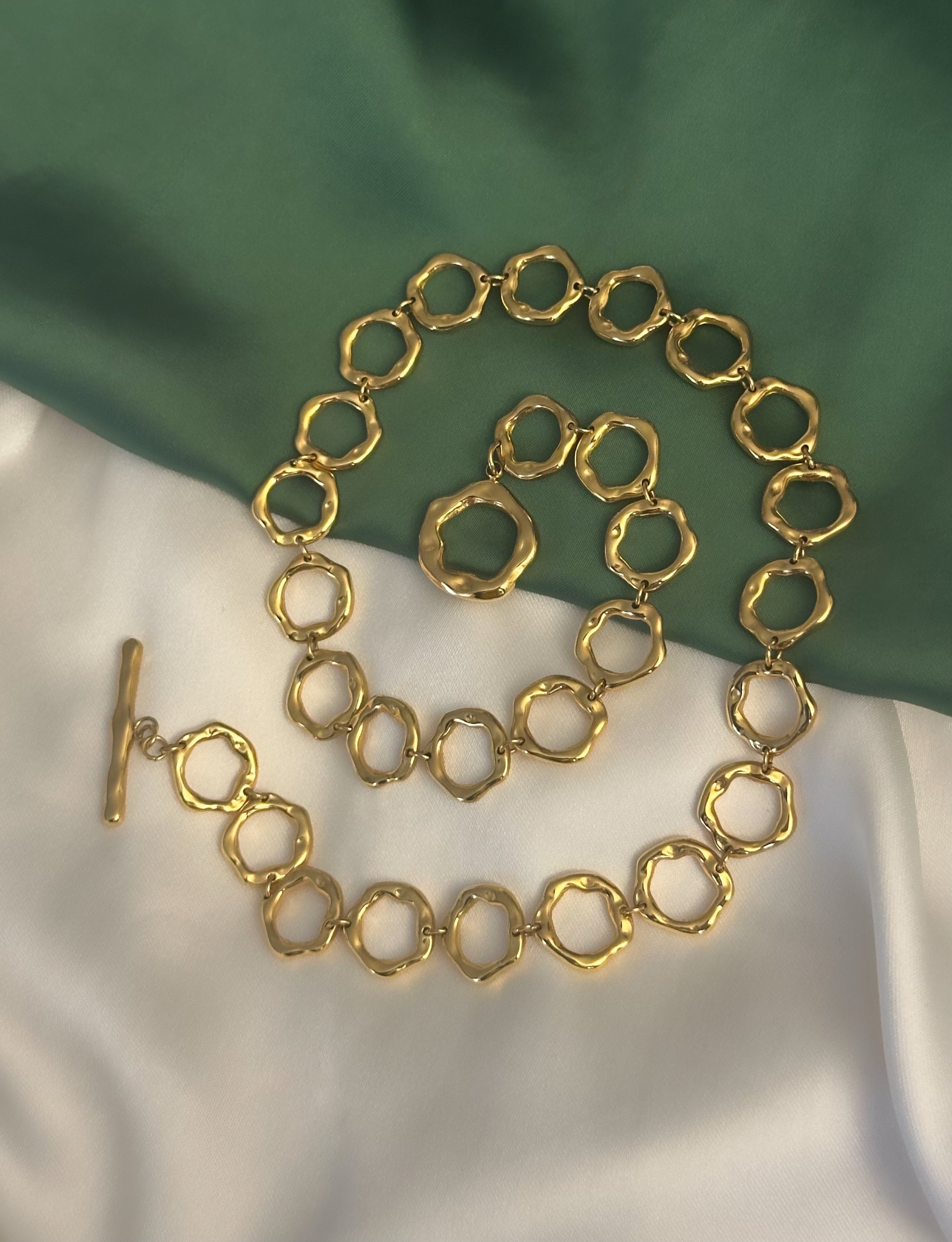Top view 18K gold necklace irregular circles waterproof alterego jewellery